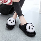 paire de pantoufles panda noir
