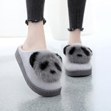 chaussons grises peluches