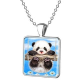 pendentif photo de panda fond bleu